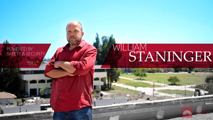 william bill staninger arms crossed on rooftop