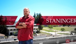 william bill staninger security coordinator arms crossed on rooftop